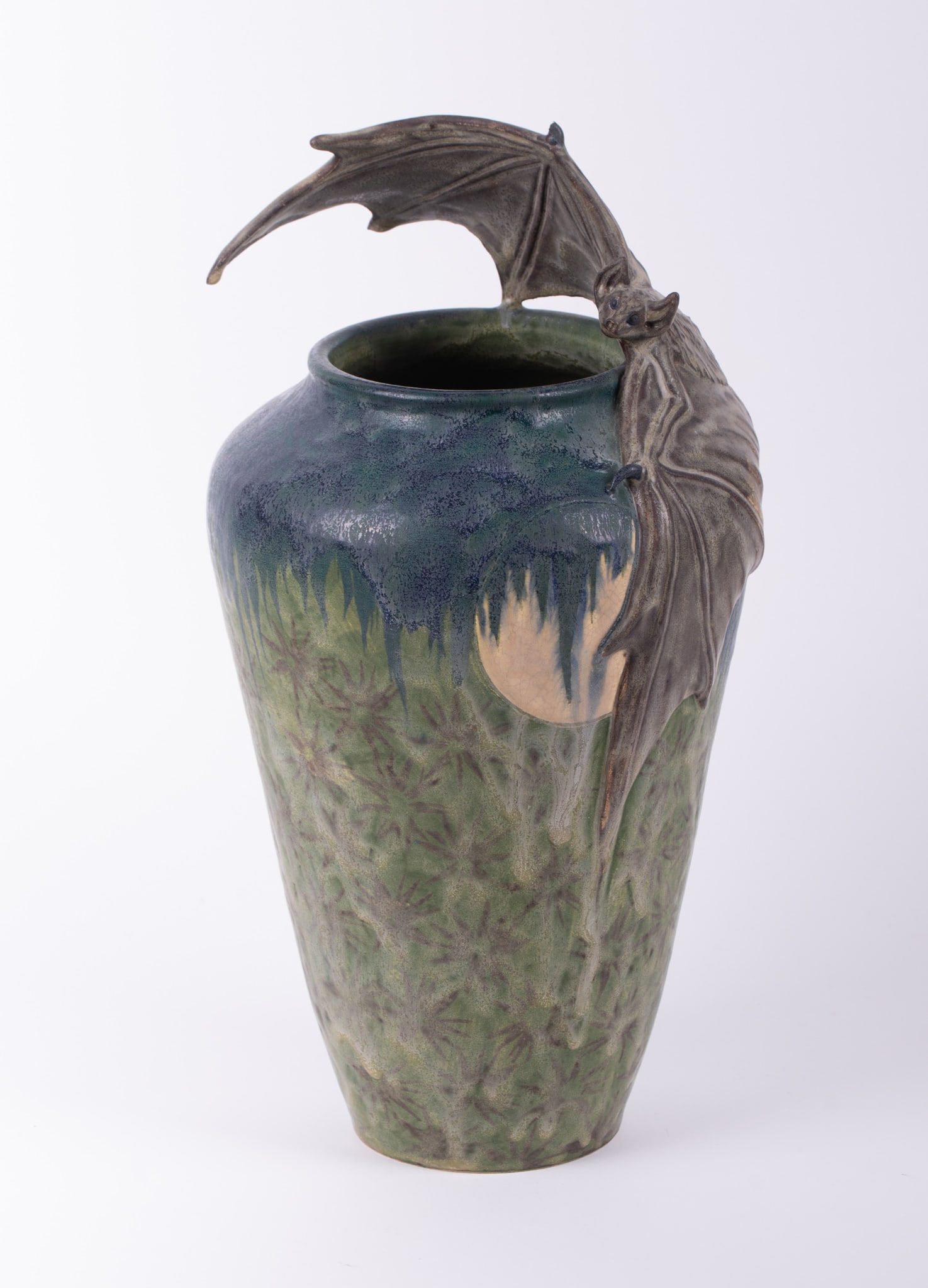 A Richard Freiwald Art Pottery Bat Vase: A Richard Freiwald Art Pottery Bat VaseHighland Park, NJ, by the contemporary artist Richard Freiwald, a gothic style Fledermaus (Bat) vase. The tall amphora style vessel featuring a full figure bat h