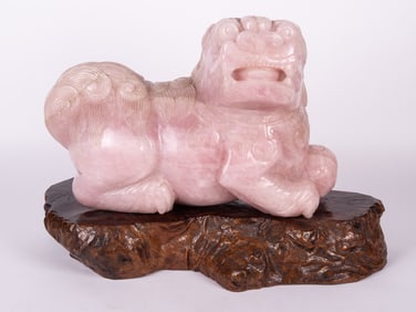 A Large Chinese Carved Rose Quartz Carving of a Foo Lion