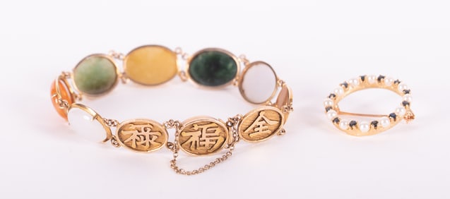 14K Yellow Gold Asian Bracelet with Stones along with a 14K Brooch