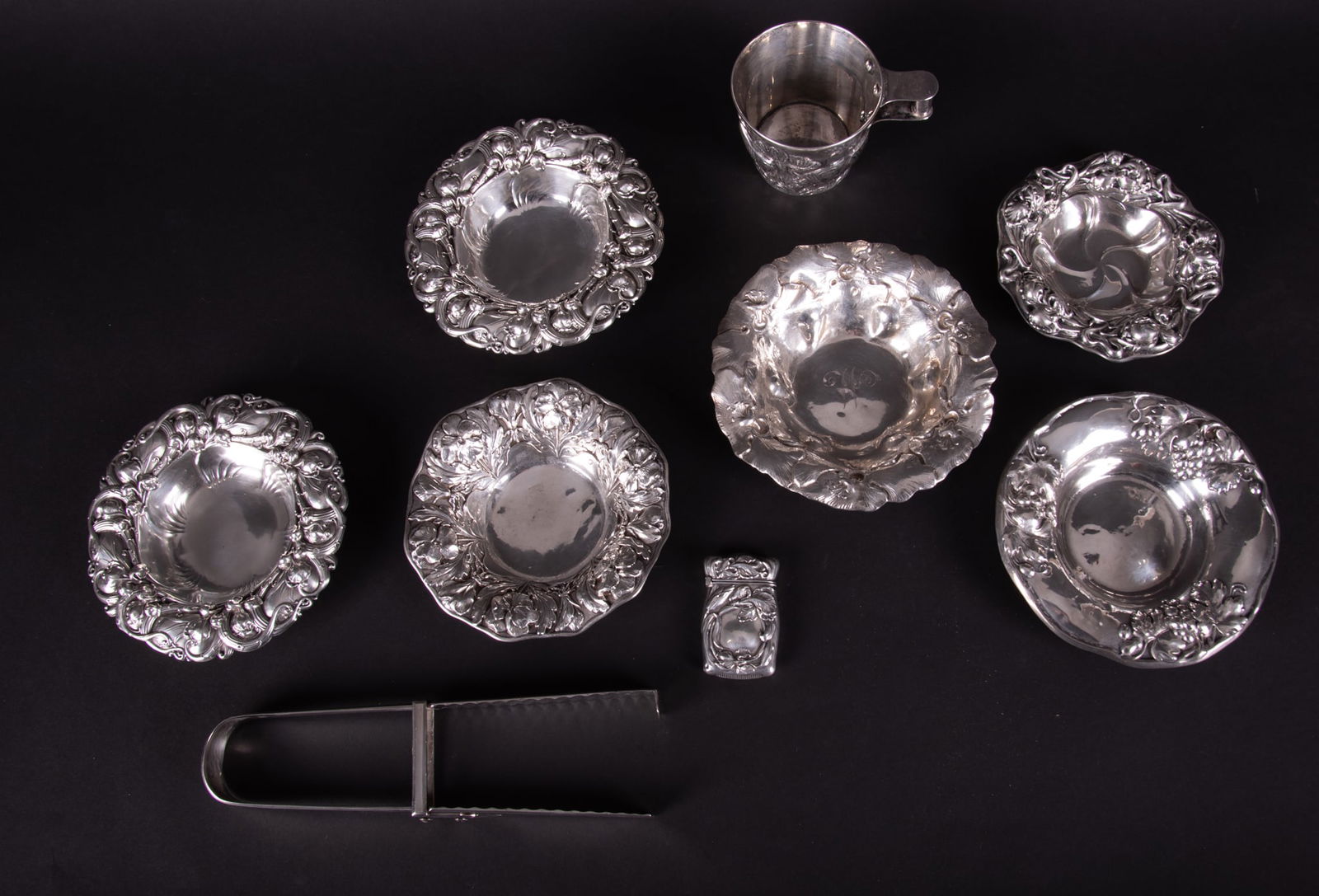 A Collection of Antique Sterling Silver Table Accessories: A Collection of Antique Sterling Silver Table AccessoriesA good grouping of sterling small pieces including 6 diminutive Art Nouveau bowls (minor dings), a hand-made sterling handled cup with depictio