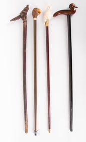 Four Hand Carved Walking Sticks