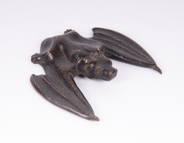 A Bronze Bat Paperweight