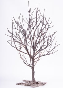 Brutalist Metal Sculpture of a Woman Sprouted As A Tree in Winter