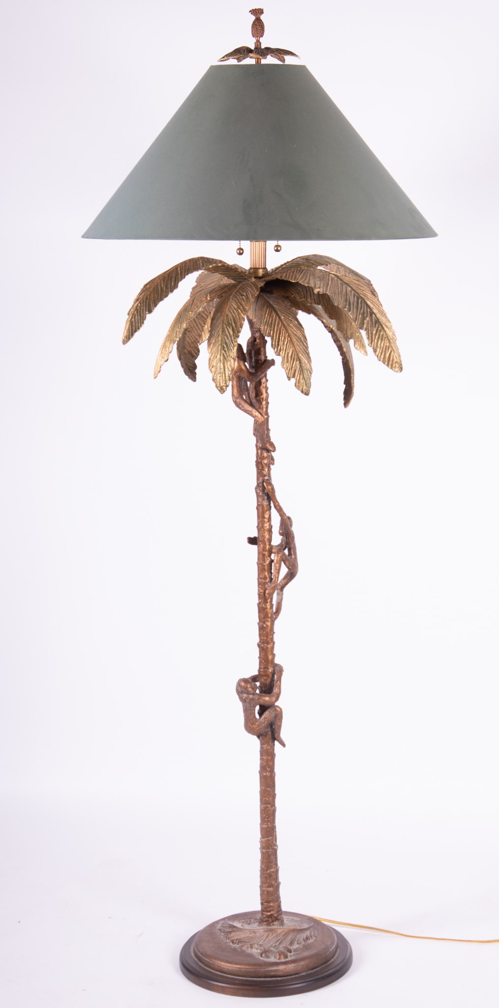 Frederick Cooper Hollywood Regency Floor Lamp: Frederick Cooper Hollywood Regency Floor LampPalm tree form, with climbing monkeys and a pineapple finial. Maker's label on the socket.Provenance: The Estate of Diana Eley, St. Louis, MOHeight: 75 inc