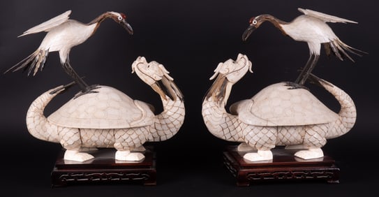 A Large Pair of Carved Bone and Horn Crane Mounted Turtle Dragons