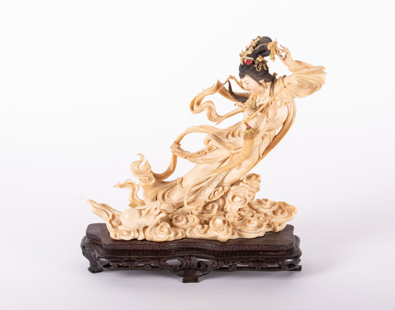 A Chinese Carved Figural Group, Goddess and Rabbit: A Chinese Carved Figural Group, Goddess and RabbitChina, early to mid 20th century, a very well carved and colored bone figural group depicting a Goddess, often referred to as Chang?e, the Goddess of