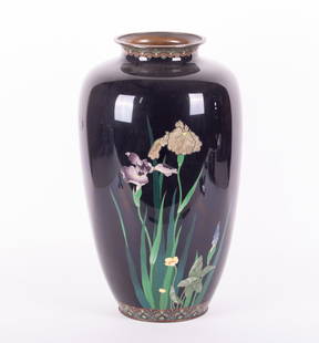 A Large Japanese Meiji Period Cloisonne Vase: A Large Japanese Meiji Period Cloisonne VaseJapan, early 20th century, the large vessel featuring a white crane among iris and other blooming flora, within a black ground.Provenance: The Estate of Dia