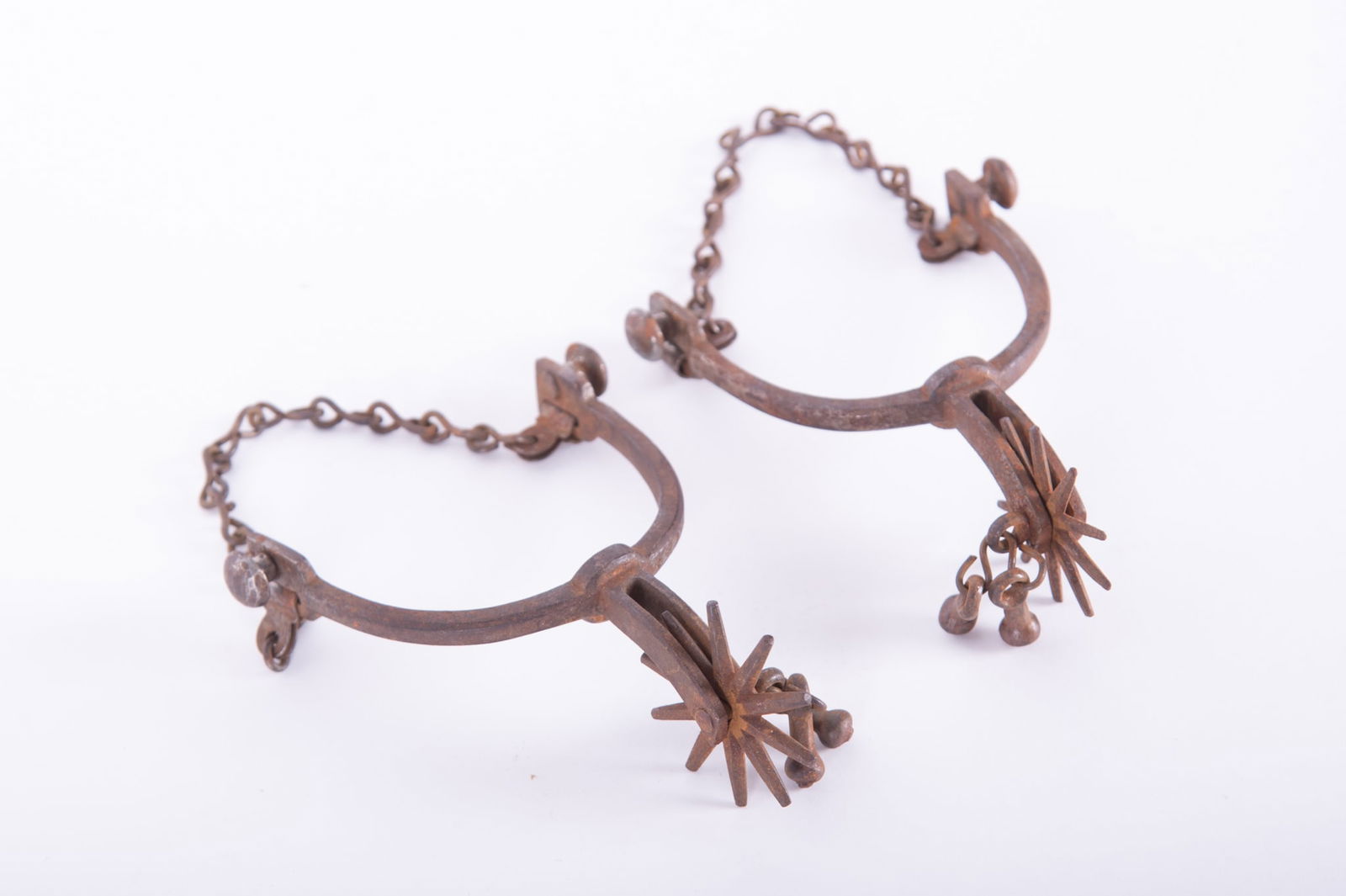 Antique Pair of Western Spurs, Possibly Buermann: Antique Pair of Western Spurs, Possibly Buermannriveted shank to heel connection, left and right, each one with chasing on the outside. Unmarked, good condition.