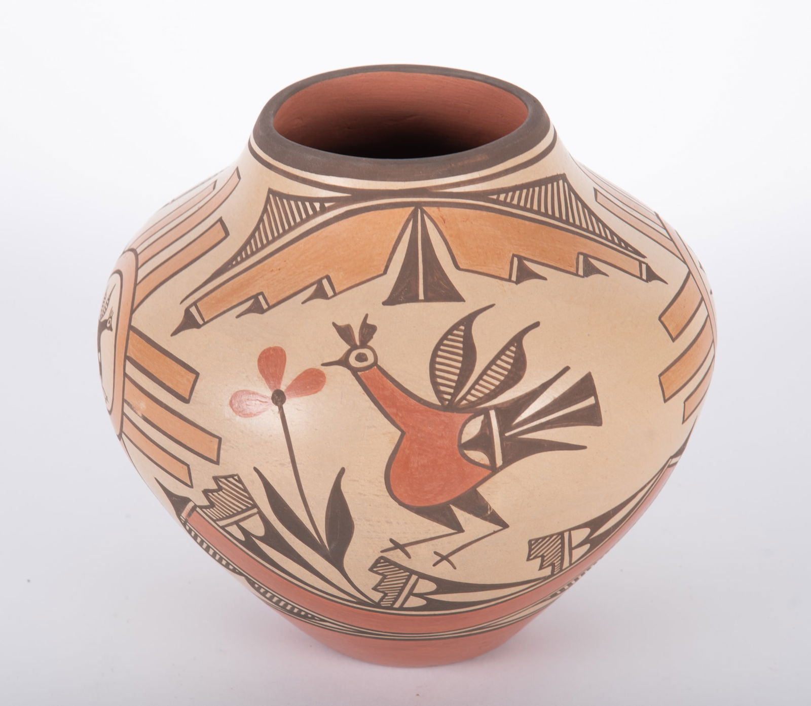 Elizabeth Medina Zia Pottery Vessel: Elizabeth Medina Zia Pottery VesselOlla-type vessel painted in shades of orange and brown with road runners and geometric patterns.Height: 9 inches; Diameter: 10 inches