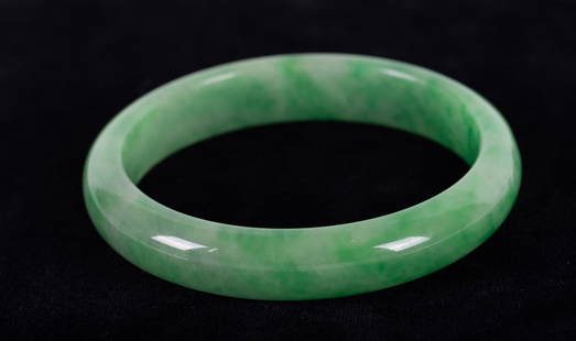 Chinese Green Jade Bangle: Chinese Green Jade BangleBeautiful mottled green color on this bangle. Inside diameter is 2 1/2 inches.