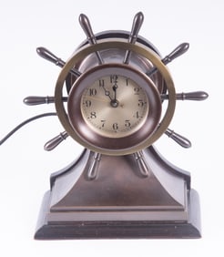 An Unmarked Electric Yacht Wheel Ships Bell Clock