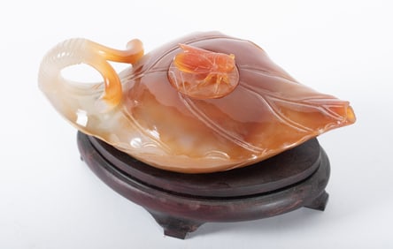A Chinese Carved Agate Sculpture of an Oil Lamp