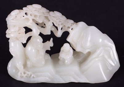 A Chinese Jade Carving of a Scholar and Student