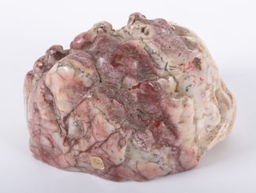 A Chinese "Chicken-Blood" Stone Carving