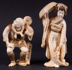 A Japanese Okimono of a Geisha and a Gentleman