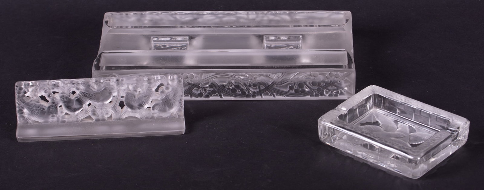 An R. Lalique Mirabeau Inkwell, No. 440: An R. Lalique Mirabeau Inkwell, No. 440 France, a rarely found double inkwell with clear and frosted birds to the glass blotter, which covers the base having clear and frosted berries around the circu