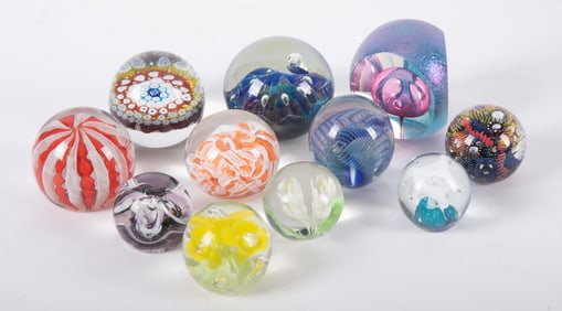 A Collection of Eleven Art Glass Paperweights, Circa 1980-2000