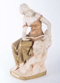 A Royal Dux Porcelain Figure Of A Young Woman Reading