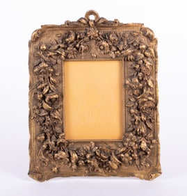 An Elaborate Gilt Bronze Picture Frame