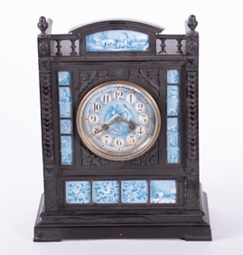 An Antique Ebony Finished Zodiac Plaque Mantel Clock