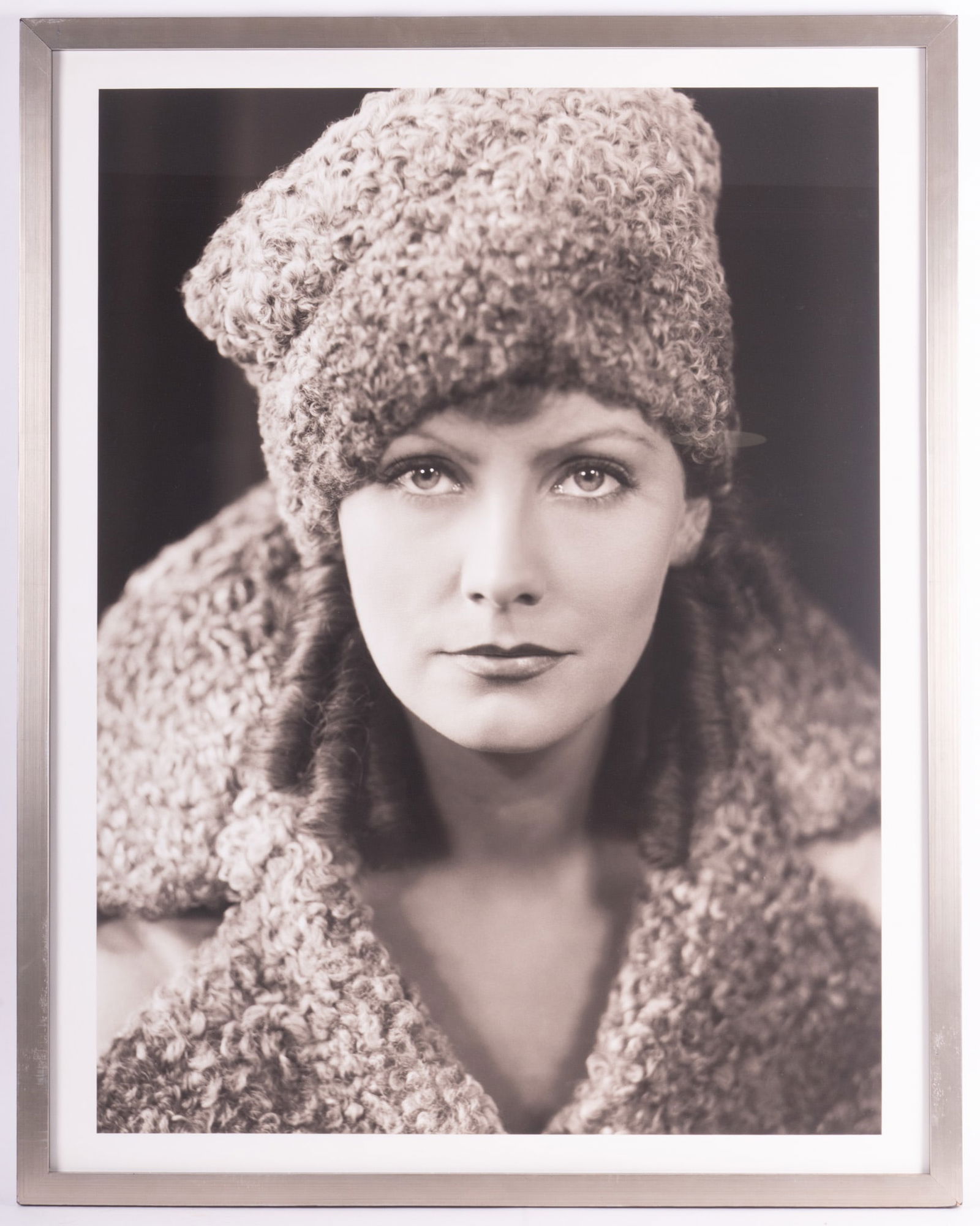 George Hurrell, Los Angeles, CA (1904-1992), Greta Garbo, black and white photograph: George HurrellLos Angeles, CA, (1904-1992)Greta Garboblack and white photographestate stamped, framed.Provenance: The Estate of Diana Eley, St. Louis, MO43 x 33 1/2 inches (visible)