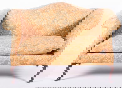 Pair of Queen Anne design camel back settees with outward scrolling arms and gold floral upholstery.