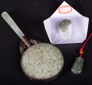 Jade Carvings including Pendants and a Mirror
