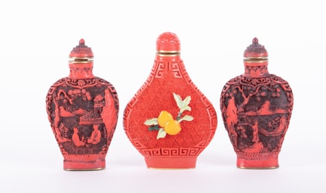 Three Cinnabar Carved Snuff Bottles