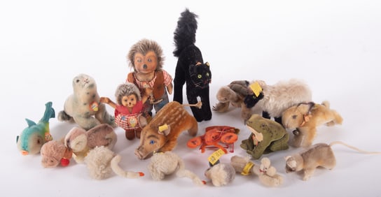 A Large Collection of Eighteen Vintage Steiff Animals