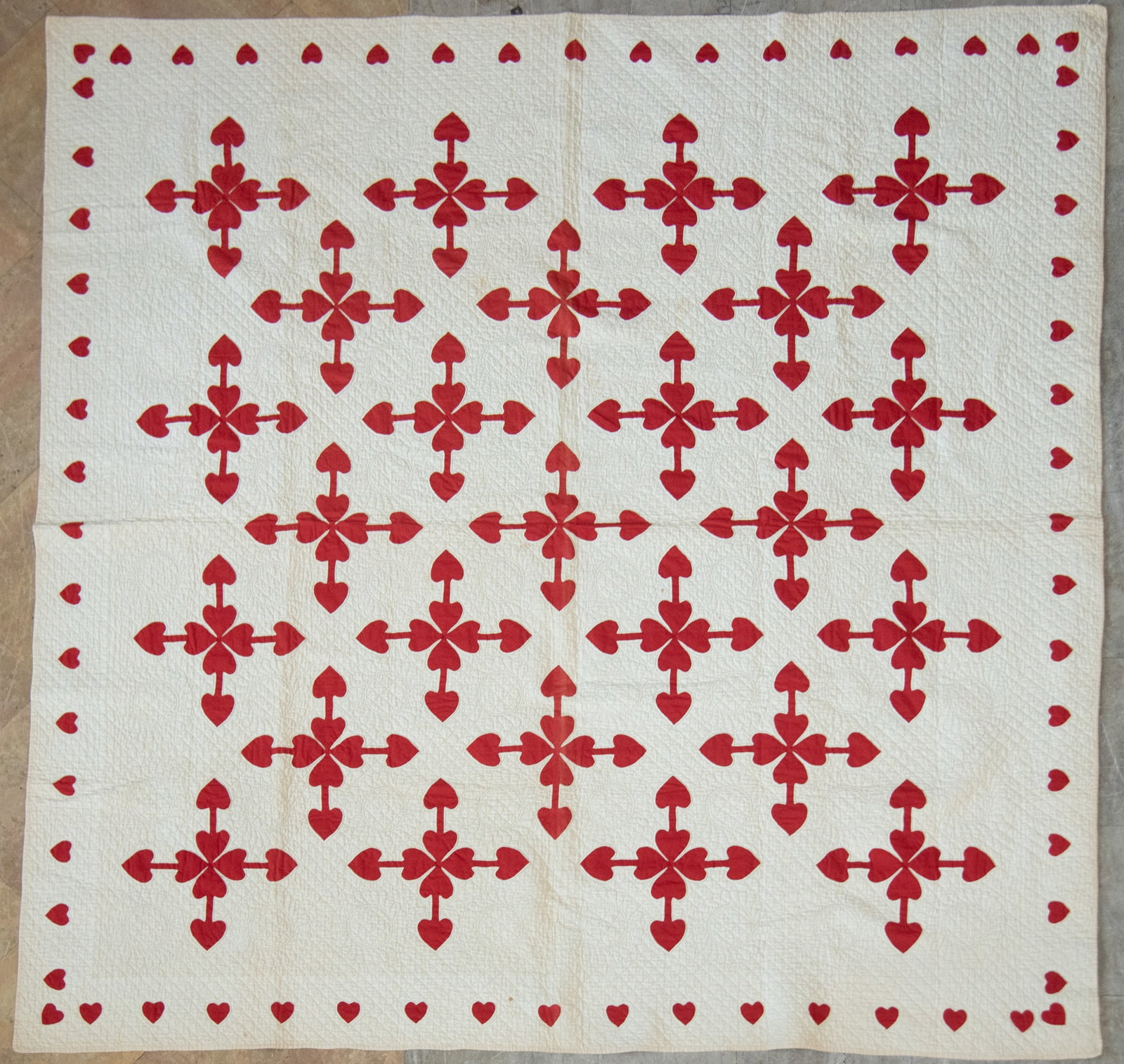 Red Heart Applique Quilt 1880's: Red Heart Applique Quilt 1880's red heart appliques hand stitched onto white base. with hanging sleeve on reverse. Red and white quilts were popular from about 1840-1940. The availability of colorfast