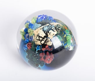 A Josh Simpson Inhabited Planet Paperweight