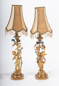 A Charming Pair of Bronze Cupid Boudoir Table Lamps