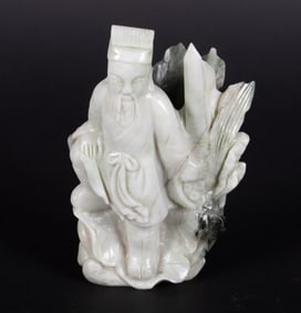 A Chinese Hardstone Carving of a Scholar