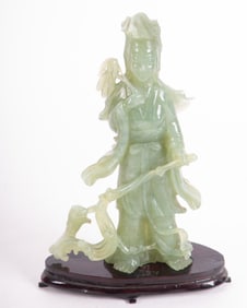 A Chinese Carved Jade Figure of Guanyin