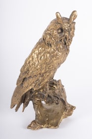 A Brass Sculpture Of A Horned Owl