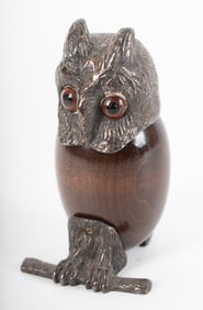 A Wood and Silvered Metal Sculpture of an Owl