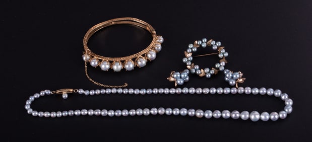 An Extraordinary Grey Cultured Pearl Parure
