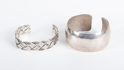 Large Sterling Cuff Paired with a Braided Sterling Cuff