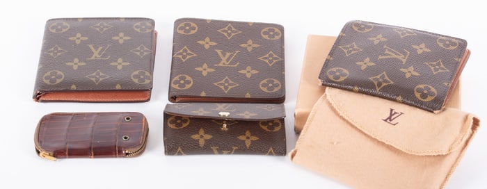 Four Louis Vuitton and a Princess Gardner Wallets and Key Holders
