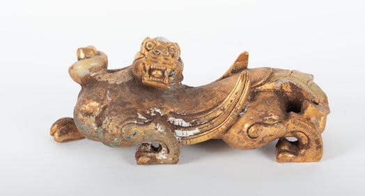 A Chinese Han Style Gold-Leaf Jade Dragon Beast