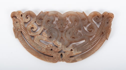 A Finely Carved Jade Dragon Ornament