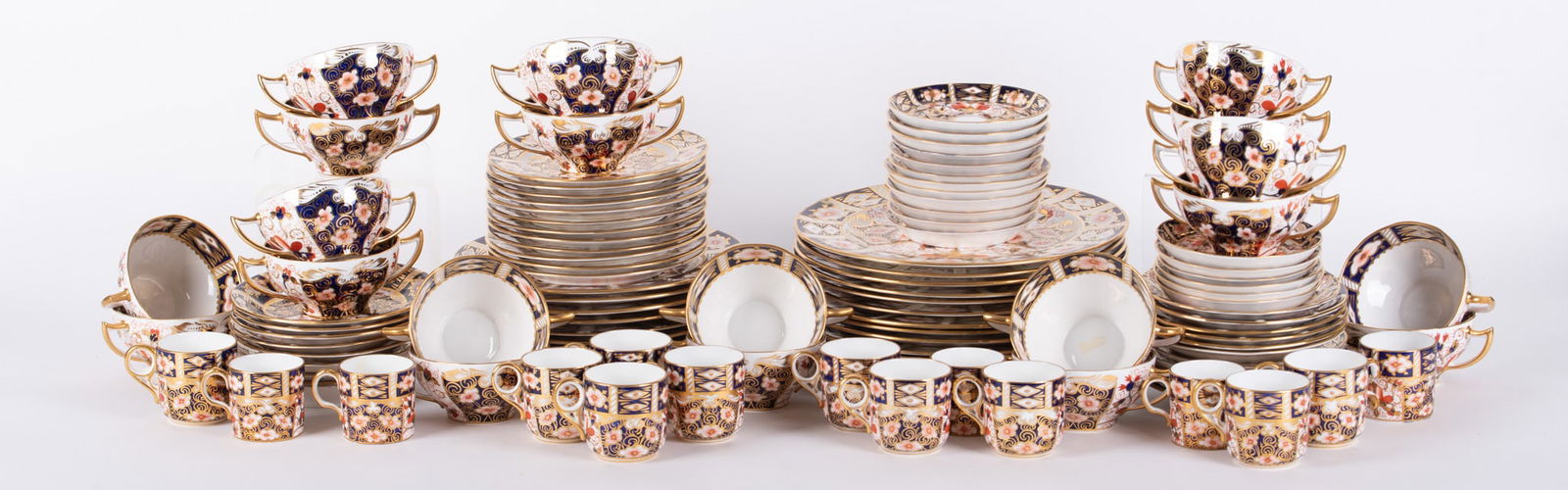 An Assembled Collection of Royal Crown Derby Porcelain Dinnerware, Traditional Imari: An Assembled Collection of Royal Crown Derby Porcelain Dinnerware, Traditional ImariEngland, #2451, a large collection of Derby's Imari pattern consisting of: Twelve 9 1/8 inch plates, one 10 1/2 inch
