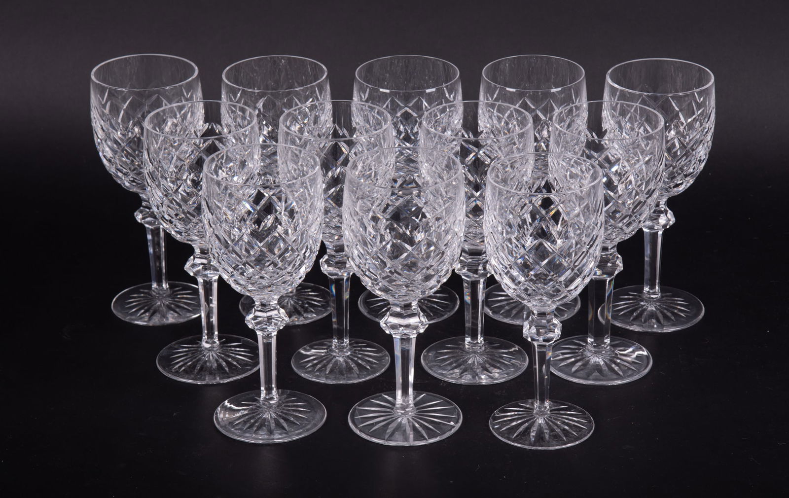 A Set of Twelve Crystal Water Goblets, Powerscourt by Waterford: A Set of Twelve Crystal Water Goblets, Powerscourt by WaterfordSigned Waterford to the base, 12 pieces, cut criss-cross on bowl, dates of production: 1969 - 20177 5/8 inches tall