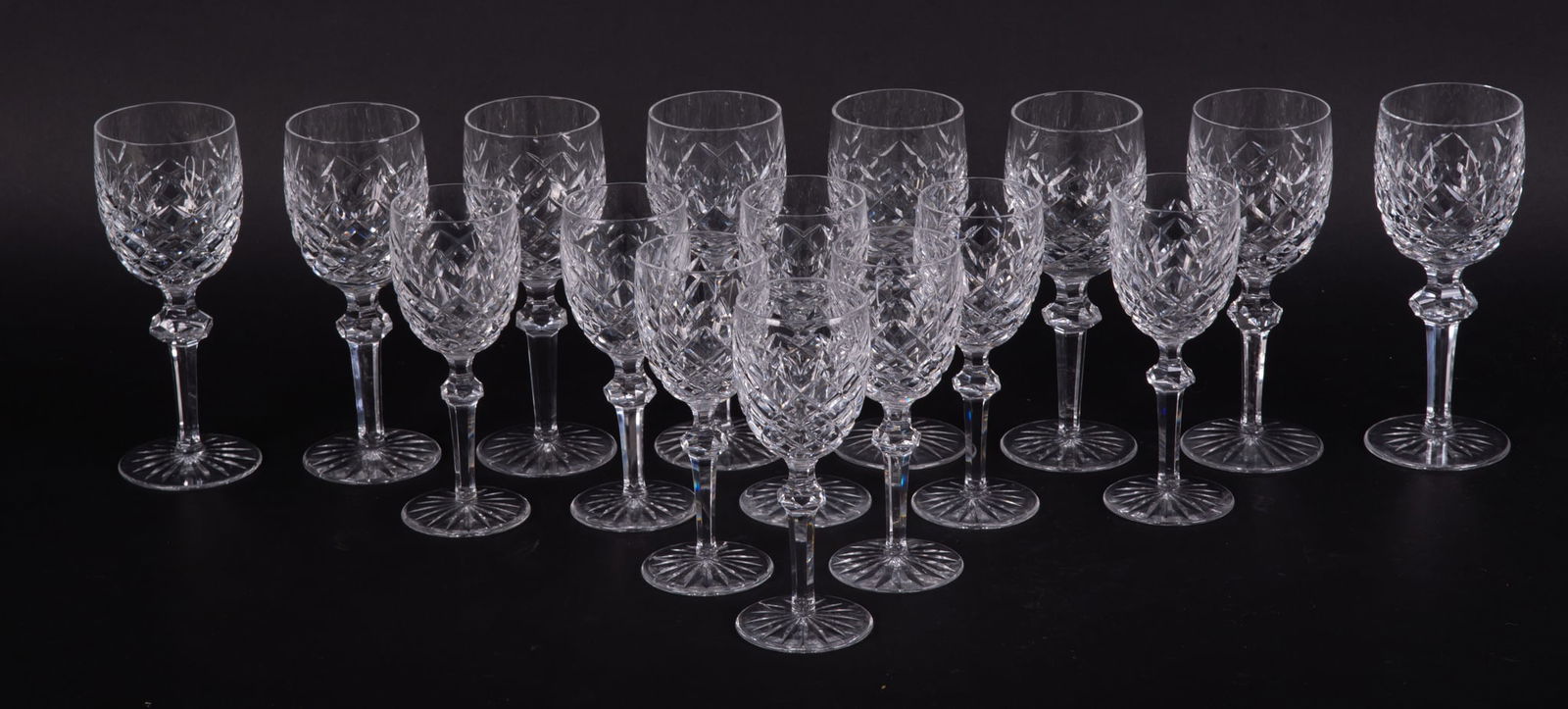 A Set of Sixteen Crystal Claret and White Wine Goblets, Powerscourt by Waterford: A Set of Sixteen Crystal Claret and White Wine Goblets, Powerscourt by WaterfordSigned Waterford to the base, the lot includes eight 7 1/8 inch Claret Wine goblets and eight 6 3/8 inch White Wine gobl