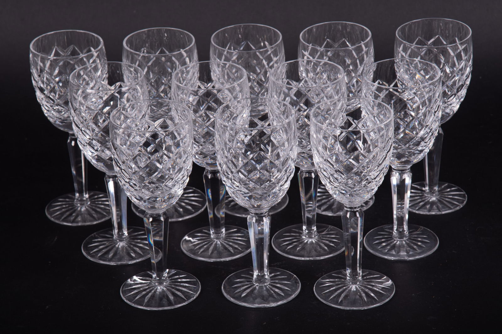 A Set of Twelve Crystal Wine Goblets, Powerscourt by Waterford: A Set of Twelve Crystal Wine Goblets, Powerscourt by WaterfordSigned Waterford to the base, 12 pieces, cut criss-cross on bowl, dates of production: 1969 - 20176 1/2 inches tall