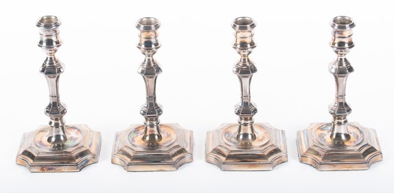 A Matched Set of Four English 18th Century Style Plated Silver Candlesticks