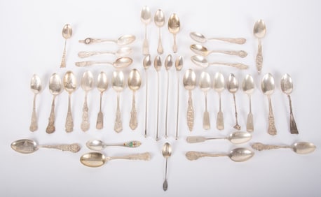 A Large Collection of Sterling Silver Souvenir Spoons