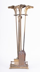 A Brass Equestrian Fireplace Tool Set