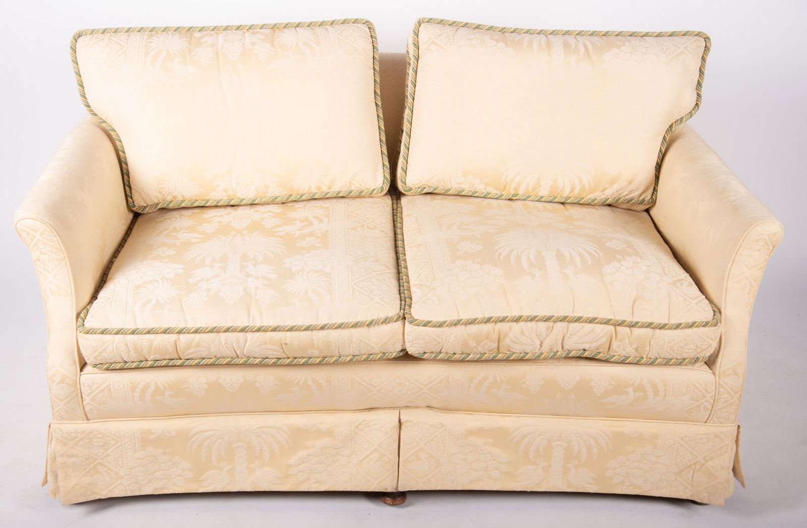 Modern Two Person Settee: Modern Two Person SetteeUpholstered in Damask fabric depicting love birds in an exterior landscape resting on turned and block legs.30 x 56 x 28 inches