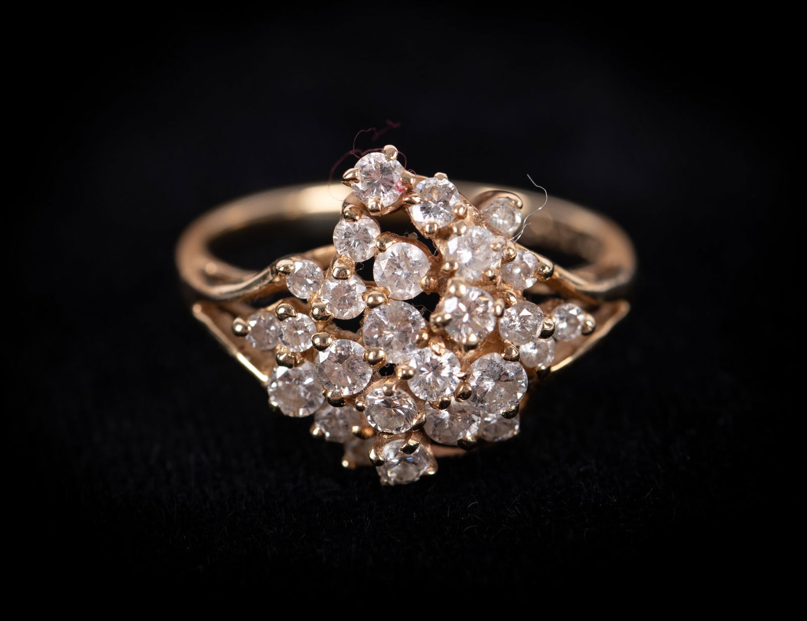 14K Yellow Gold Diamond Cluster Ring: 14K Yellow Gold Diamond Cluster Ring This classic vintage ring was designed by Colby Davis. It has approximately .50CTW and weighs 3.7g. Ring size is a 6.